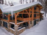 Built into the slope of the mountain, this incredible 6300 sq ft log home offers 3 floors of living space.